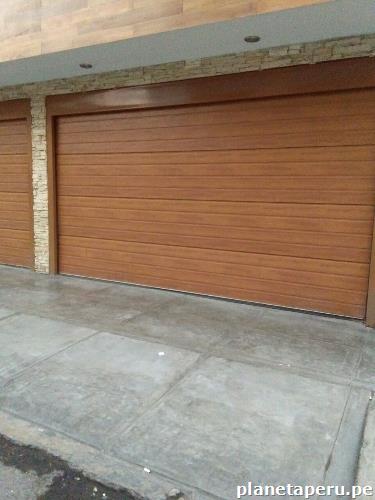 Fabricamos e instalamos Puertas de Garaje seccionales , somos